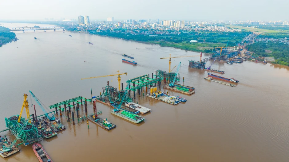 Ngắm đại công trường xây cầu vô cực ở Hà Nội: 8 tháng đạt gần 40% tiến độ, 26.000 tấn thép đã sẵn sàng, 500 người làm 3 ca để vượt qua cột mốc khó khăn nhất Ngắm đại công trường xây cầu vô cực ở Hà Nội: 8 tháng đạt gần 40% tiến độ, 26.000 tấn thép đã sẵn sàng, 500 người làm 3 ca để vượt qua cột mốc khó khăn nhất