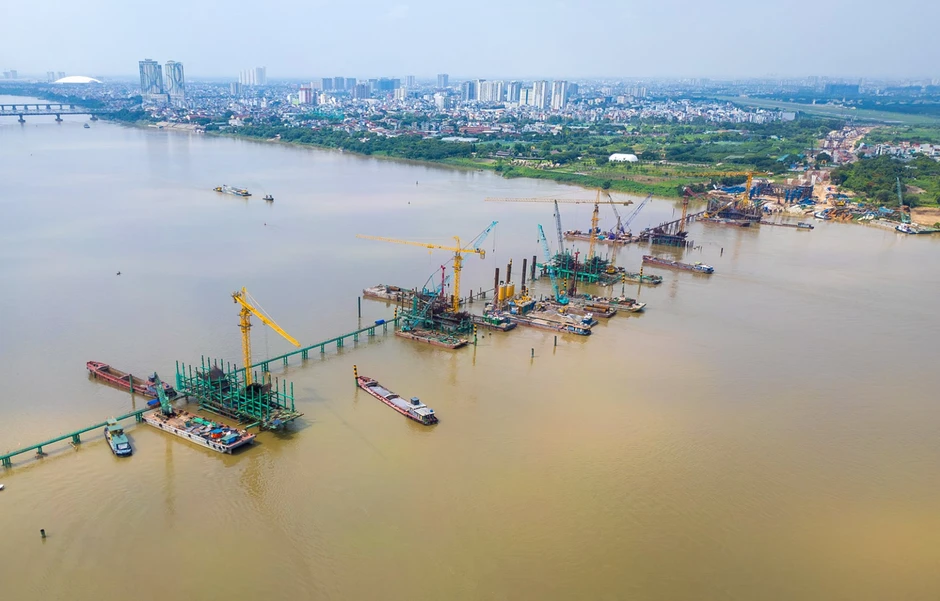 Ngắm đại công trường xây cầu vô cực ở Hà Nội: 8 tháng đạt gần 40% tiến độ, 26.000 tấn thép đã sẵn sàng, 500 người làm 3 ca để vượt qua cột mốc khó khăn nhất Ngắm đại công trường xây cầu vô cực ở Hà Nội: 8 tháng đạt gần 40% tiến độ, 26.000 tấn thép đã sẵn sàng, 500 người làm 3 ca để vượt qua cột mốc khó khăn nhất