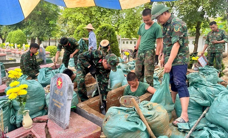 Mưa nhiều khiến việc khai quật, lấy mẫu hài cốt tại Nghĩa trang liệt sĩ Độc Lập thêm khó khăn Mưa nhiều khiến việc khai quật, lấy mẫu hài cốt tại Nghĩa trang liệt sĩ Độc Lập thêm khó khăn