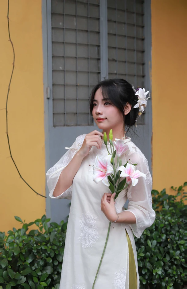 Áo dài ngày Tết: Nét đẹp không đổi giữa lòng đô thị hiện đại Áo dài ngày Tết: Nét đẹp không đổi giữa lòng đô thị hiện đại
