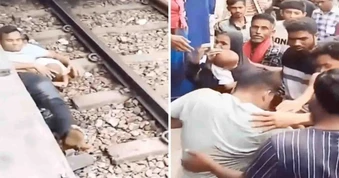 Bangladesh: Cha lao xuống đường cứu con, thoát chết kỳ diệu khi tàu chạy