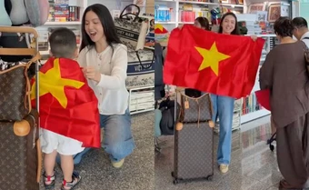 Chu Thanh Huyền khoác cờ Tổ quốc cho con trai, chiếm trọn spotlight tại sân bay khi sang Thái Lan cổ vũ Quang Hải và ĐT Việt Nam
