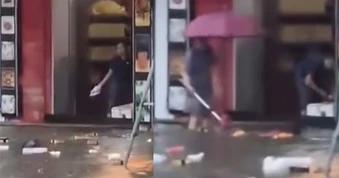 Hành động lạ của người phụ nữ trong thời điểm Vinh mưa to kỷ lục