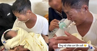 Xúc động cảnh ông nội đeo ống thở, cố bế cháu lần cuối trước khi qua đời: Con dâu chia sẻ chuyện phía sau