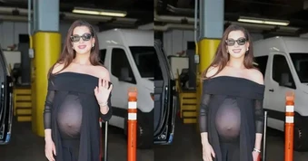 Anne Hathaway mang thai lần ba ở tuổi U50, tự tin khoe bụng bầu với trang phục xuyên thấu nhưng lại gây ra nhiều tranh luận
