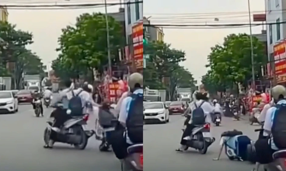 Nữ sinh bị bạn giật tóc, ngã chúi xuống đường Nữ sinh bị bạn giật tóc, ngã chúi xuống đường