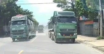 Lấn sang làn ngược chiều để vượt xe, tài xế đầu kéo bị phạt tiền