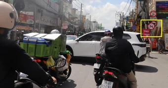 Ngày đầu cấm ô tô trên đường Cách Mạng Tháng Tám ở TPHCM: Tài xế vội tạt vào hẻm