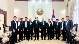 VRG đề xuất mở rộng đầu tư 50.000ha cao-su tại Lào trong chuyến thăm, chúc Tết Bunpimay