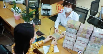 Các ngân hàng ồ ạt giảm lãi suất huy động, lãi suất cho vay có giảm?