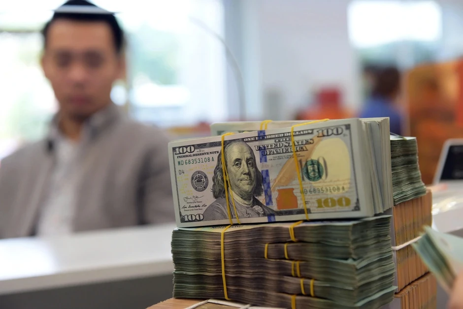Chốt lời vàng, dòng tiền đổ vào USD Chốt lời vàng, dòng tiền đổ vào USD