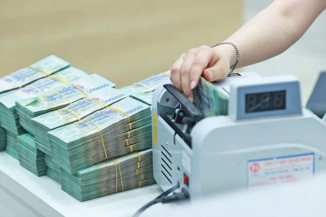 Tiền gửi ngân hàng lập kỷ lục, chủ yếu là của người dân Tiền gửi ngân hàng lập kỷ lục, chủ yếu là của người dân