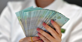 Trả lương nhân viên sau khi nghỉ việc, doanh nghiệp khấu trừ thuế TNCN thế nào?