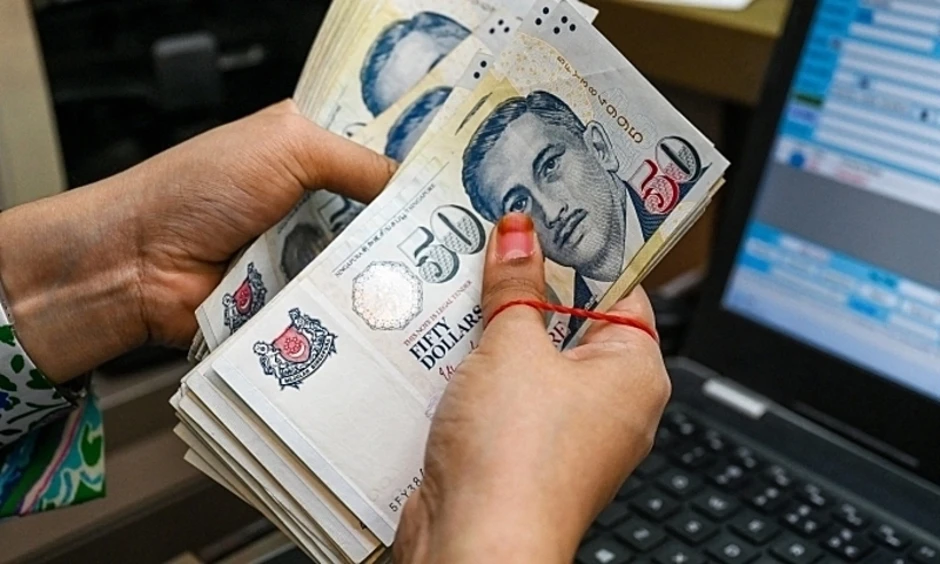 Singapore phát tiền cho 2,4 triệu dân trong cơn bão giá Singapore phát tiền cho 2,4 triệu dân trong cơn bão giá