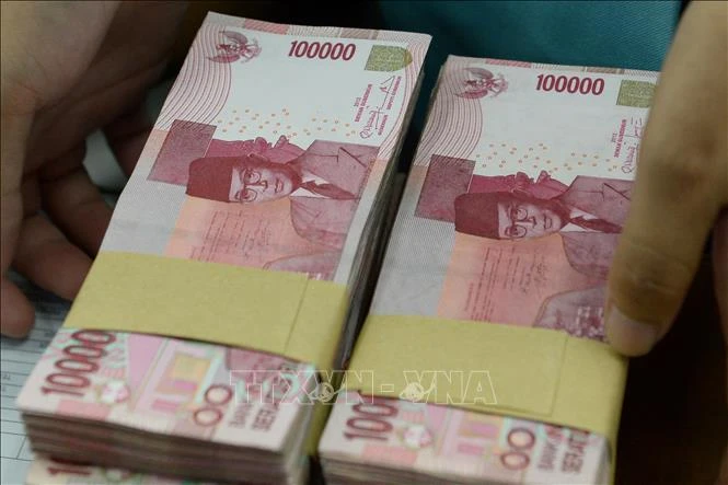 Đồng rupiah của Indonesia giảm xuống mức thấp kỷ lục so với USD Đồng rupiah của Indonesia giảm xuống mức thấp kỷ lục so với USD