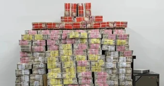 Iraq thu 20 triệu USD, 5kg vàng giấu trong chai nước ở nhà cựu quan chức