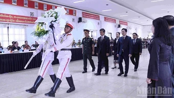 Lễ tưởng niệm và bàn giao hài cốt liệt sĩ Việt Nam tại thủ đô Vientiane