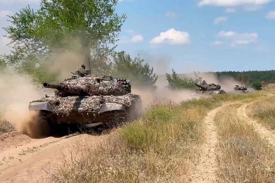 Quân Nga cố xâm nhập biên giới Ukraine ở Kharkiv, EU áp thêm trừng phạt Moscow Quân Nga cố xâm nhập biên giới Ukraine ở Kharkiv, EU áp thêm trừng phạt Moscow