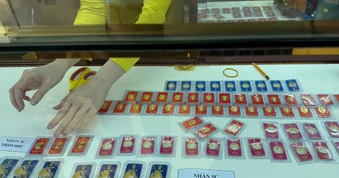 Chiều 18-8: Giá vàng thế giới tiếp tục giảm, giá vàng trong nước "hạ nhiệt"