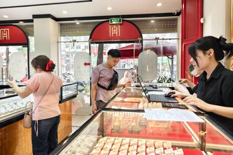Giá vàng sáng ngày 21/5 tiếp tục hạ nhiệt, chênh lệch mua - bán vẫn neo cao