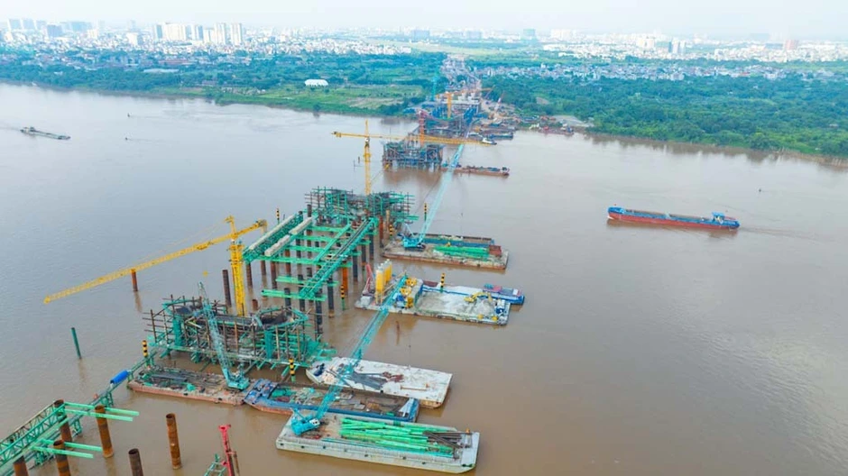 "Siêu cầu" vượt sông Hồng hơn 16.000 tỷ đồng đạt tiến độ “thần tốc”, dựng vòm thép vô cực sau 8 tháng "Siêu cầu" vượt sông Hồng hơn 16.000 tỷ đồng đạt tiến độ “thần tốc”, dựng vòm thép vô cực sau 8 tháng