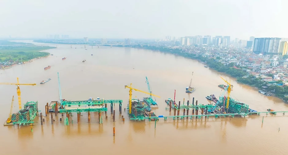 "Siêu cầu" vượt sông Hồng hơn 16.000 tỷ đồng đạt tiến độ “thần tốc”, dựng vòm thép vô cực sau 8 tháng "Siêu cầu" vượt sông Hồng hơn 16.000 tỷ đồng đạt tiến độ “thần tốc”, dựng vòm thép vô cực sau 8 tháng