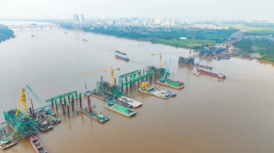 "Siêu cầu" vượt sông Hồng hơn 16.000 tỷ đồng đạt tiến độ “thần tốc”, dựng vòm thép vô cực sau 8 tháng "Siêu cầu" vượt sông Hồng hơn 16.000 tỷ đồng đạt tiến độ “thần tốc”, dựng vòm thép vô cực sau 8 tháng