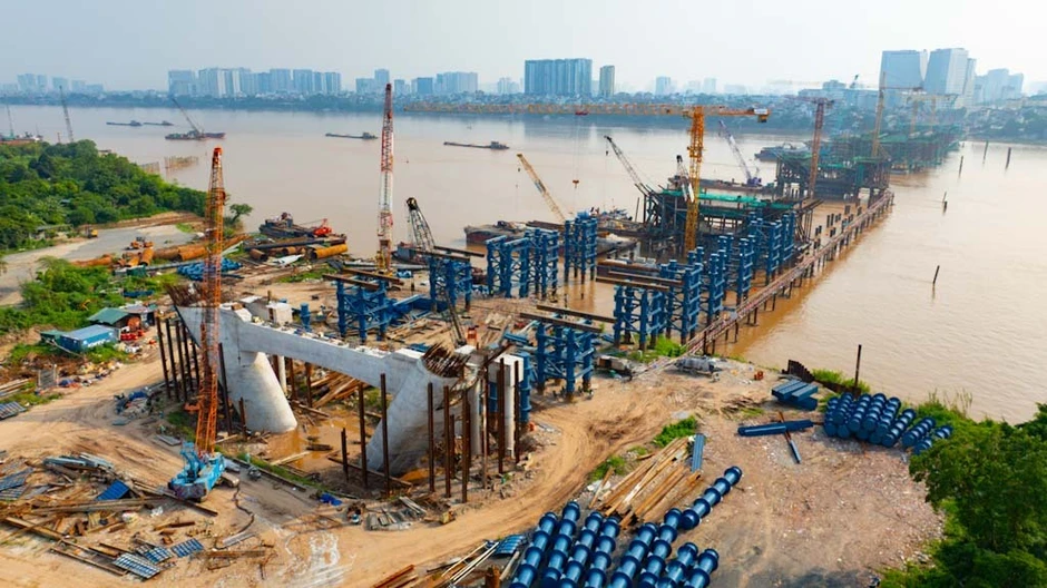 "Siêu cầu" vượt sông Hồng hơn 16.000 tỷ đồng đạt tiến độ “thần tốc”, dựng vòm thép vô cực sau 8 tháng "Siêu cầu" vượt sông Hồng hơn 16.000 tỷ đồng đạt tiến độ “thần tốc”, dựng vòm thép vô cực sau 8 tháng