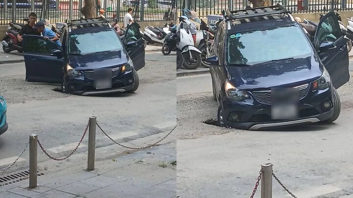 Ô tô sụt hố cống trước cổng Bệnh viện K Hà Nội gây ùn tắc giao thông