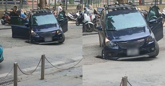 Ô tô sụt hố cống trước cổng Bệnh viện K Hà Nội gây ùn tắc giao thông