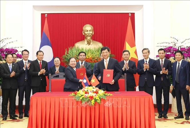 Tăng cường hợp tác giữa hai Ban Tổ chức Trung ương của Đảng Cộng sản Việt Nam và Đảng Nhân dân Cách mạng Lào Tăng cường hợp tác giữa hai Ban Tổ chức Trung ương của Đảng Cộng sản Việt Nam và Đảng Nhân dân Cách mạng Lào