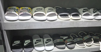 Triệt phá chuỗi cửa hàng bán giày giả nhãn hiệu Nike, Adidas ở TPHCM