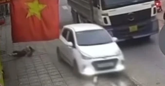 Triệu tập nữ tài xế ô tô hất văng cô gái đứng trên vỉa hè rồi bỏ đi