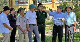 Xác minh thông tin mộ liệt sĩ tập thể trong sân trụ sở Đảng ủy xã