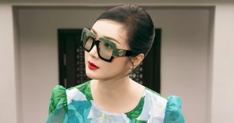 Hoa hậu Giáng My diện trang phục họa tiết hoa dành dành, khoe sắc vóc U60