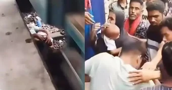 Người cha dũng cảm lao xuống đường ray cứu con thoát chết trong gang tấc khi đoàn tàu chạy qua