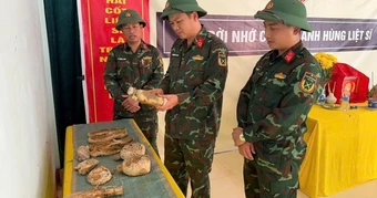 Hai hài cốt liệt sĩ được phát hiện tại điểm cao 402