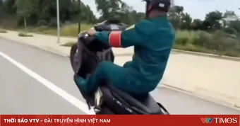 Thanh niên mặc trang phục dân quân tự vệ “bốc đầu” xe trên phố