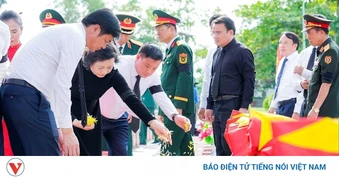 Xúc động Lễ truy điệu và an táng 80 hài cốt liệt sĩ Việt Nam hy sinh tại Lào