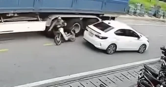 Nổi bật tuần qua: Người đàn ông thoát chết may mắn dưới bánh xe container