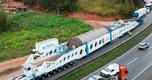 Phát hiện một xe moóc siêu trọng dài 123 mét, nặng 636 tấn di chuyển cùng đoàn xe hộ tống, thực hiện một nhiệm vụ chiến lược xuyên quốc gia