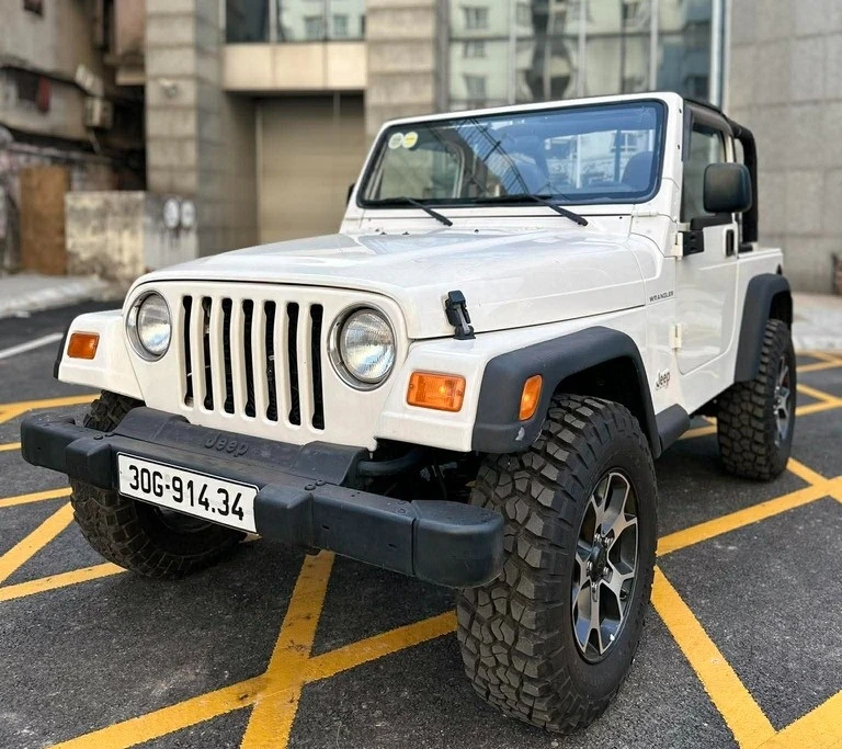 Từng là xe tuần tra, Jeep Wrangler TJ 2001 thành hàng hiếm 850 triệu tại Hà Nội Từng là xe tuần tra, Jeep Wrangler TJ 2001 thành hàng hiếm 850 triệu tại Hà Nội