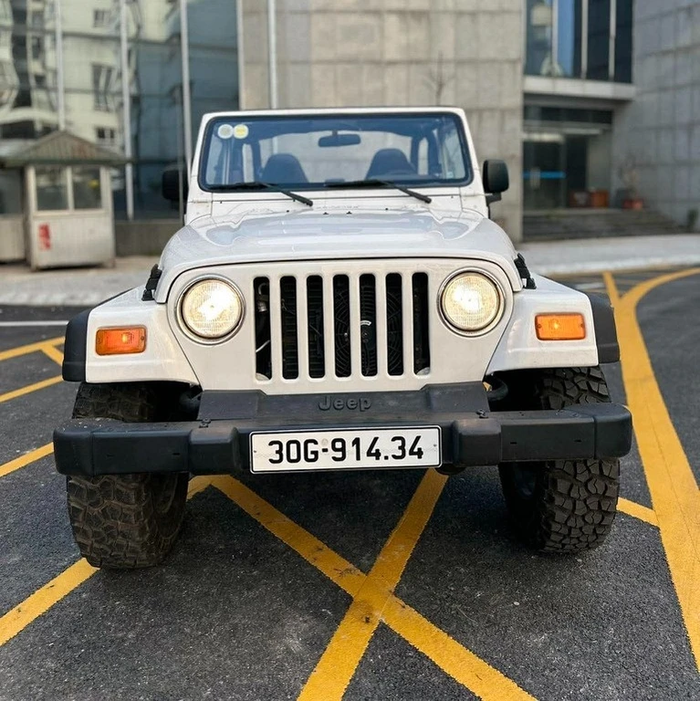 Từng là xe tuần tra, Jeep Wrangler TJ 2001 thành hàng hiếm 850 triệu tại Hà Nội Từng là xe tuần tra, Jeep Wrangler TJ 2001 thành hàng hiếm 850 triệu tại Hà Nội